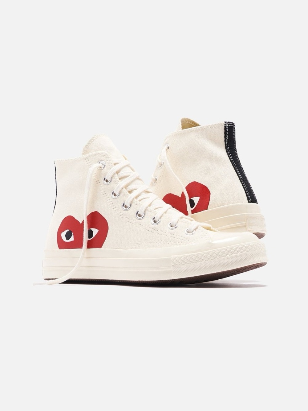 COMME DES GARÇONS PLAY White Converse
Heart Chuck 70 High Top Sneakers